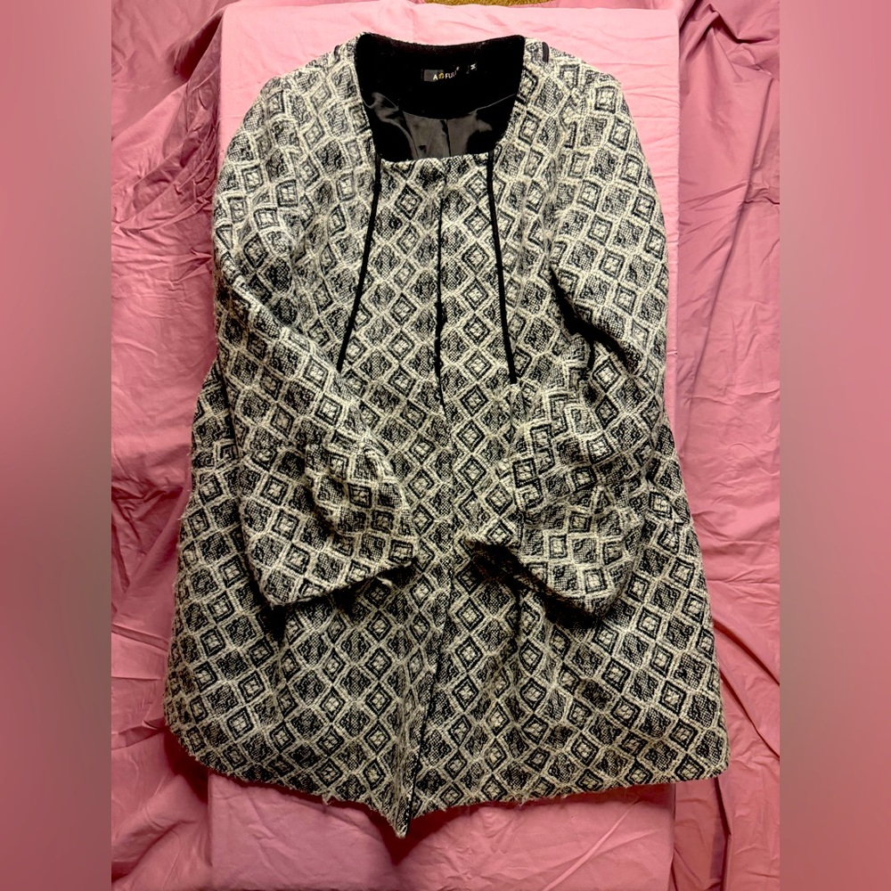 Black and white flared coat